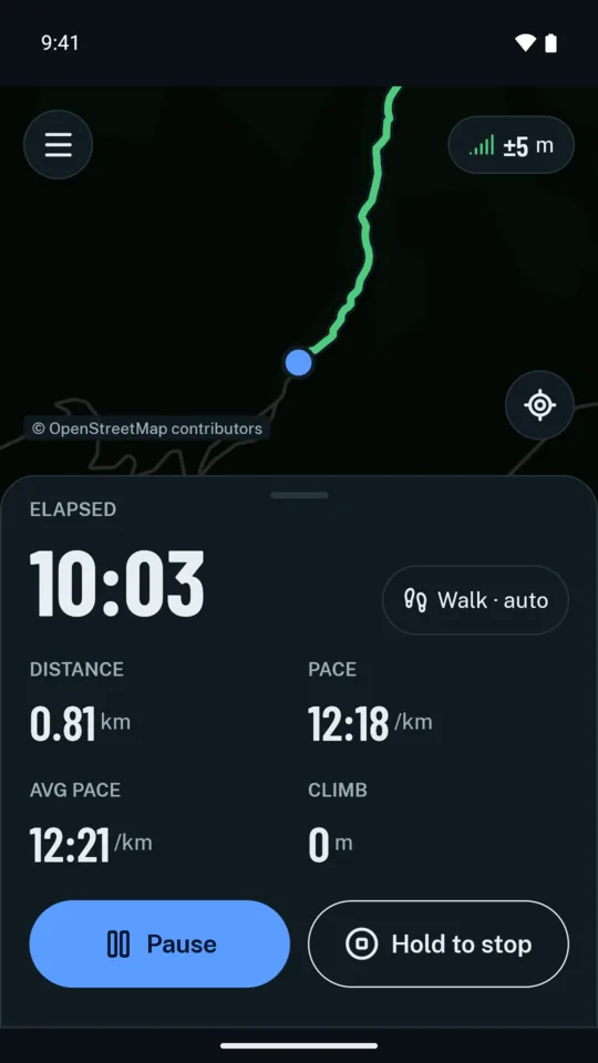 Recording a walk: the live map with the track so far, the elapsed time, distance, pace, average pace and climb, and the Pause and Hold to stop buttons.