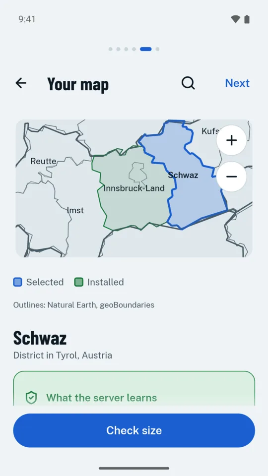 Choosing a map region while setting up: Schwaz, a district in Tyrol, selected on the map, with a button to check the download size.